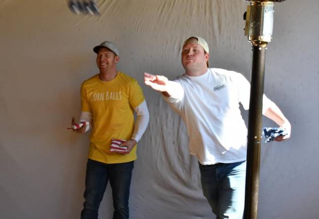 CR1 Chris Ball, left, of Vernon and Luke Boonstra of Mahwah compete in a cornhole tournament fundraiser sponsored by the Vernon Police Benevolent Association 285. (Photos by Maria Kovic)