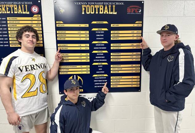 Vernon Township High School senior Gage Moskovitz, left, has the school record for rushing yards and touchdowns for a season and a career. Sophomore Matt Baumann, center, has the record for special teams tackles for a season. And senior Derek Lazier holds the new record for career passing in completions and total yards and he is tied for the record in passing touchdowns in a season. (Photo provided)