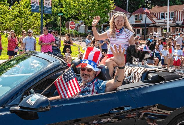 Sparta. Fourth of July events Lake Mohawk trustees ride in the parade.