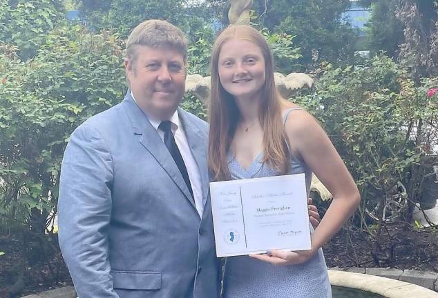 Vernon High School senior Maggie Previglian and head track coach Jim Saganiec.