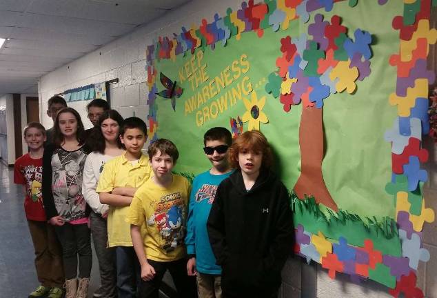 Lounsberry Hollow students spread Autism awareness Pictured in front to Back, Alex Peters, Jamie Verde, Thomas Frasco, Anthony Giovino, Emily Silagyi, Monica Salazar, Joseph Dunlop, Denes Okerlund.