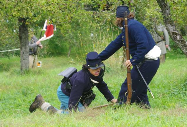 A Union Army soldier was wounded by the advancing Confederate troops.