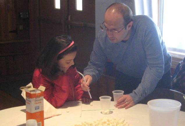 Ella and Greg Napolitano prepare for the Marshmallow Race.