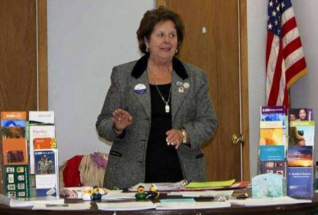 Speaker visits Vernon Woman's Club Surrounded by a wealth of materials about services for families and individuals affected by mental illness, Marjorie Strohsahl from the New Jersey State Federation of Women's Clubs speaks to the GFWC Vernon Township Woman's Club about the National Alliance on Mental Illness.