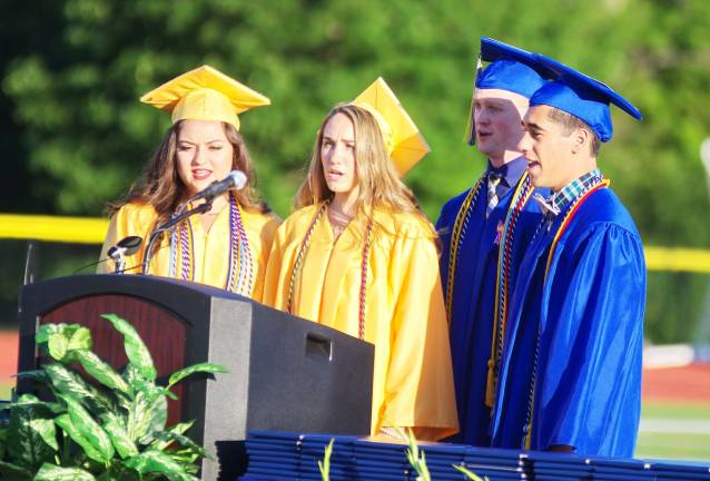 Vernon sends off graduating class Emily Hertlein, Olivia Higgins, Christopher Ploch and Anibal Rodriguez sing the Vernon Township High School Alma Mater song.