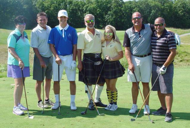 Ballyowen hosts Macallan Scotch tournament Ballyowen Ranger Joe, Christine and golfers pose with hickory golf clubs prior to teeing off on the fourth hole.