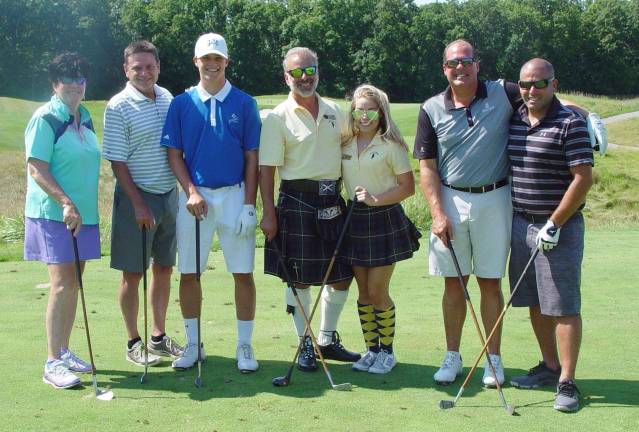 Ballyowen Ranger Joe, Christine and golfers pose with hickory golf clubs prior to teeing off on the fourth hole.