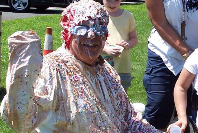 Vernon resident and Florence M. Burd Elementary School Interim Superintendent Anthony Macerino is turned into a human sundae to reward students' acts of kindness.