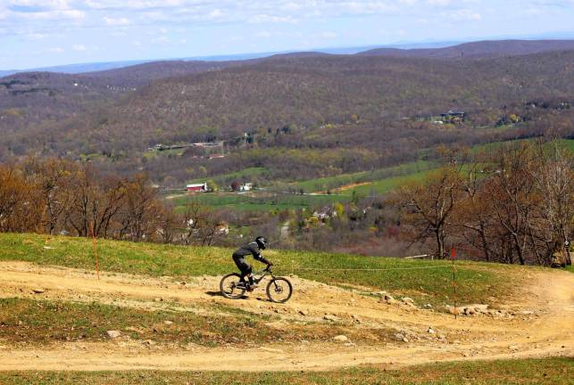 Bike trails offer expansive views on the way down.