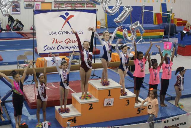 Giant Gymnastics athletes succeed at state meet All-aroudn champion Fiona Postas of Franklin, third-place winner Kate Sutphen of Sparta and fourth-place winner Cameron Volpe of Hampton are shown.