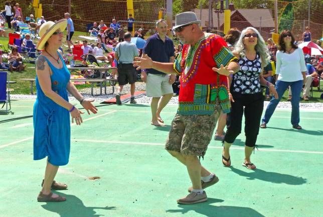 Sam Emmonis of Branchville just couldn&#xfe;&#xc4;&#xf4;t be slowed down during the performance of the VooDUDES at Mountain Creek&#xfe;&#xc4;&#xf4;s Second Annual Smoke N Blues Jazz &amp; Food Festival. Here he is shown dancing with Kay Jackson of Rockland Township, Pa.