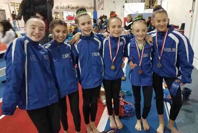 Junior Olympics team takes top three spots at sectionals Meghan Smith, Cameron Volpe, Fiona Postas, Katie Hlywa, Ashley Smith and Caroline Dietz all claimed qualifying scores at the second sectional.