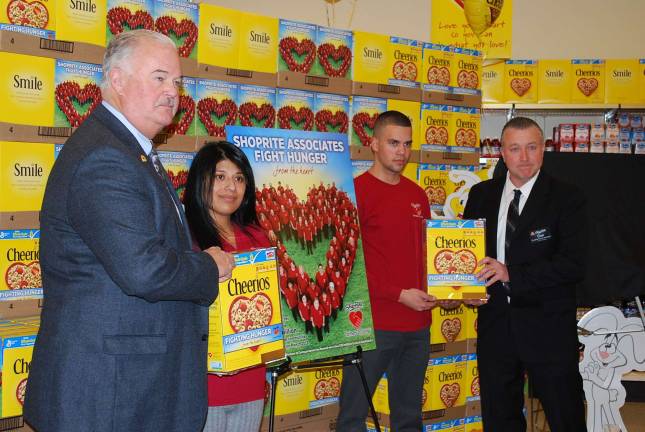 ShopRite associates from the ShopRite of Byram share with others at the unveilings of the special-edition Cheerios box to fight hunger in local communities. From left, Hank Ramberger, Denise Lewis, David Beltran and Dan Dobrzynski.