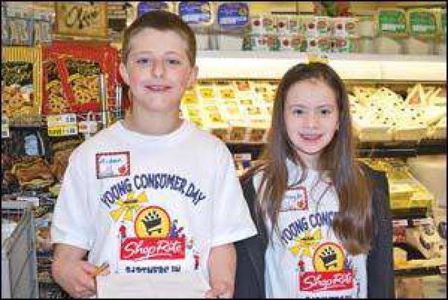 Third-graders learn to shop on Young Consumer Day Third-graders learn to shop on Young Consumer Day