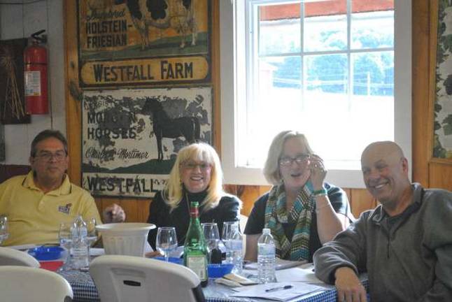 Appreciating wine Winning Team Red. From left Peter and Mary Kraus and John and Kathy Kraus.