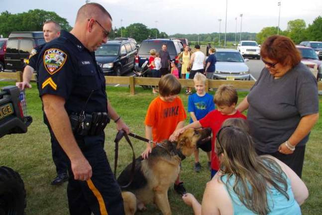 Vernon Township Police Department K9 Officer Cpl. William Gebhard and Police Dog Hobbs were a favorite with the children during the township&#x2019;s fourth annual National Night Out.