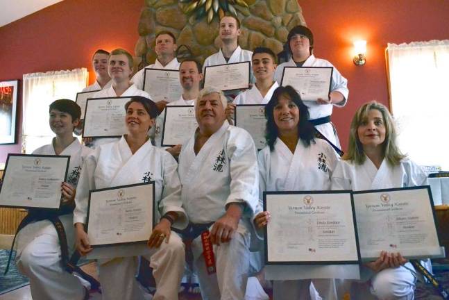 Vernon Valley Karate students promoted Pictured, from left, back row: Ian Houtman, Jim Dorsey, Barret Myzak, Christopher Halpin; middle row: Tyler Lohwin, Nick Vigiletti, Noah D.; front row: Kaitlyn Gallaugher, Sacha Dorsey, Sensei Tom Shull, Linda Boniface, Juliann Vigiletti.