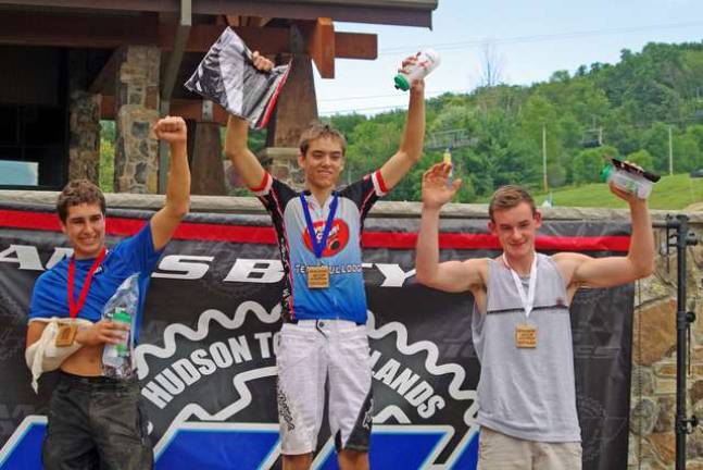 At center is Chris Compton of Califon/Glen Gardner, the first-place winner in the Category 3 Junior Men's Division in the 15-18 age group. At left is Eric Gapco, the second-place winner and at the right is third-place winner Mark Ferguson or Oak Ridge.