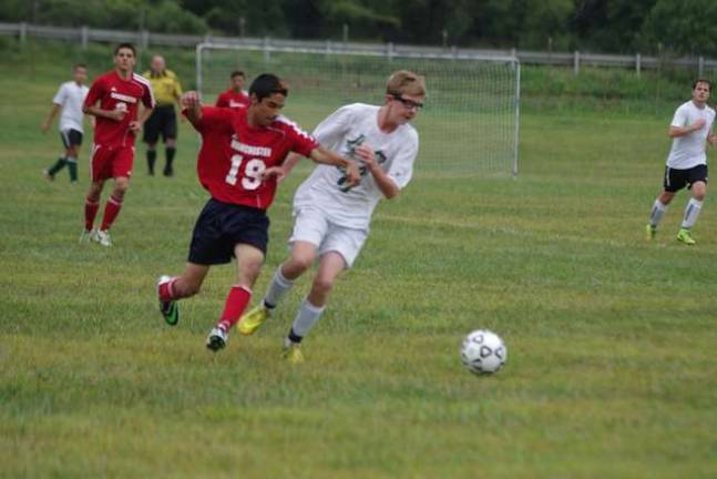 Sussex Tech Mustangs practice for season A Manchester Falcon and Sussex County Tech Mustang battle for the ball during a scrimmage.