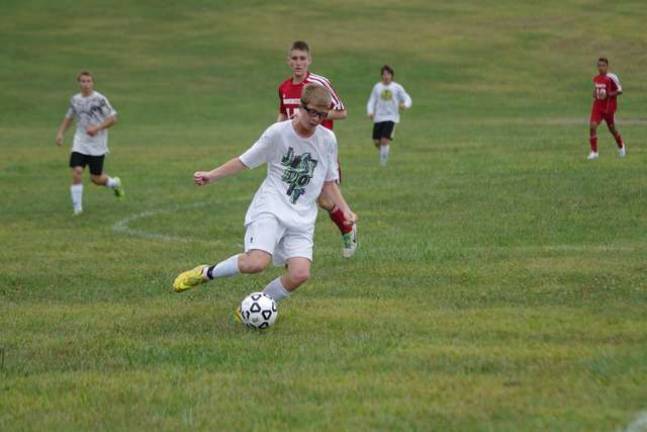 Sussex County Tech's Chris Sturm drives the ball during a scrimmage against Manchester Regional High School.