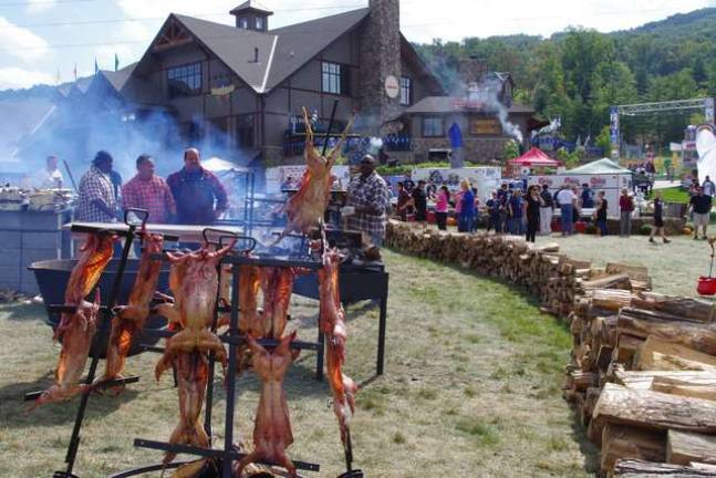 Rabbits, pigs and more slowly cook for the crowds that will follow.