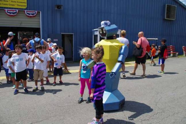 Oscar the robot is probably the most photographed personality at the fair. Although on Thursday he was so tuckered out that he needed help getting back into the administration building.