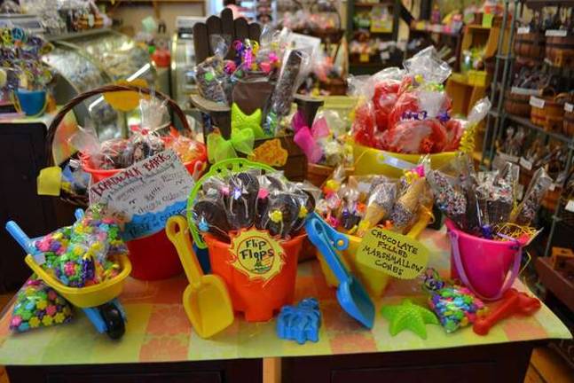Candy Apple Shoppe offers delectable apples and confections Summer selection of chocolates.
