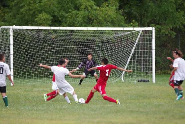 Sussex Tech Mustangs practice for season Sussex County Technical School versus Manchester Regional High School in a scrimmage.