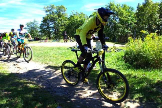 Local professional mountain bike racer Jeff Lenosky of Sparta is shown starting the fourth of five segments of the King of the Mountain Enduro Race at Mountain Creek.