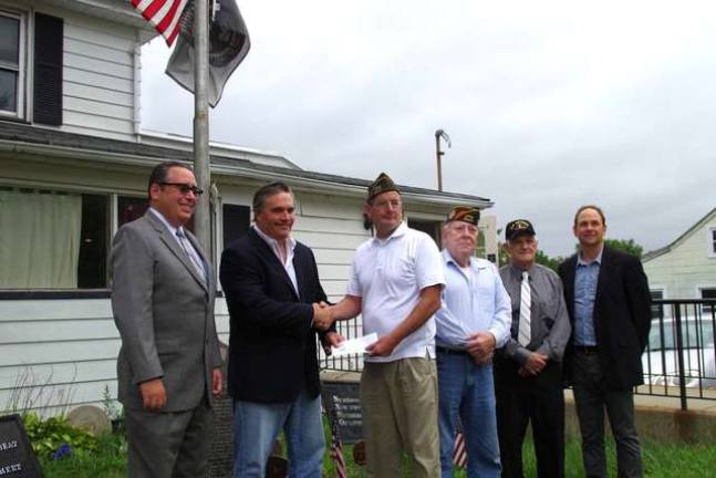 From the left are John Williams, a Vernon attorney doing pro bono work for the VFW, Crystal Springs Resort CEO Andy Mulvihill, VFW Quartermaster Bon Constantine, VFW Chaplin and Past Commander Russ Thomas, VFW Sgt. of the Guard Jim Davis, and Mountain Creek President Bill Benneyan.