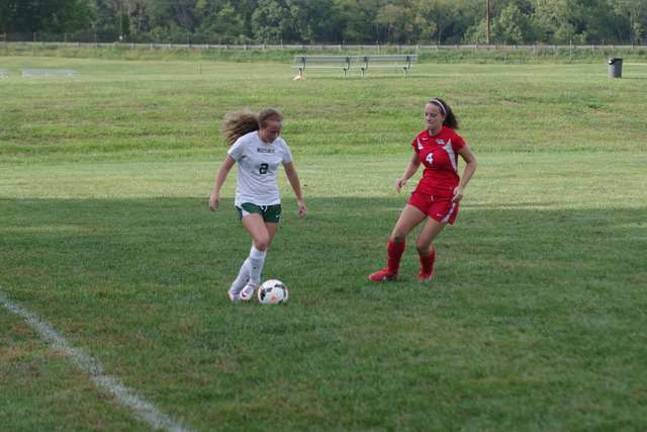 Sussex County Tech's Kayla Kopf (2) is shadowed by Lenape Valley's Hope Schwartz (4).