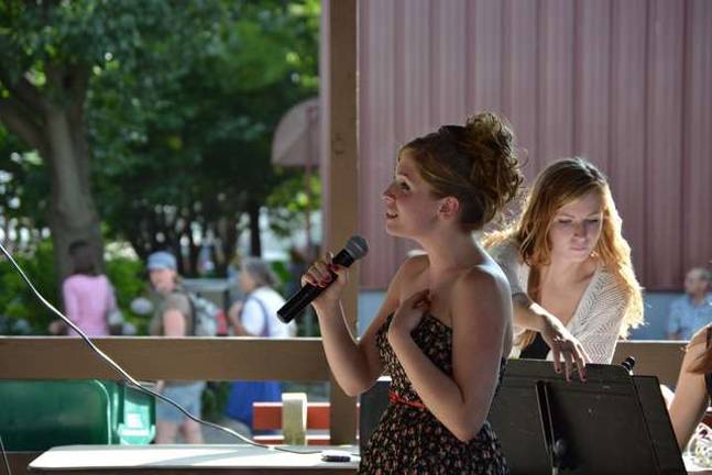High Point junior sings for seniors Kelly Wask singing at new Jersey State Fair.