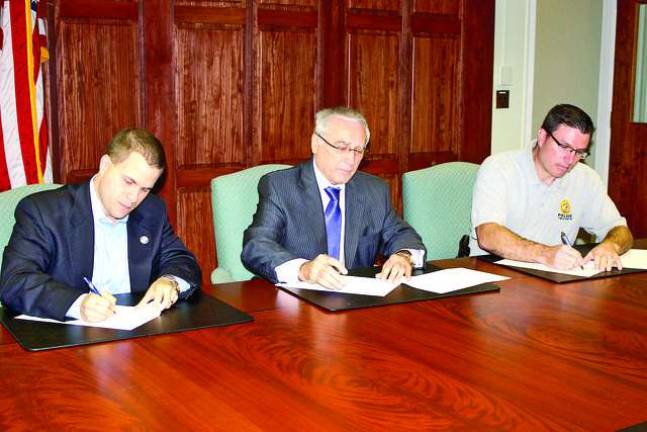 College, police sign into agreement