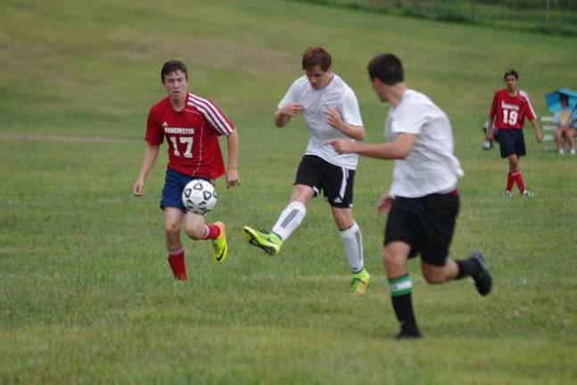 Sussex County Tech's Zach Lagrave kicks the ball during a scrimmage against Manchester Regional High School.