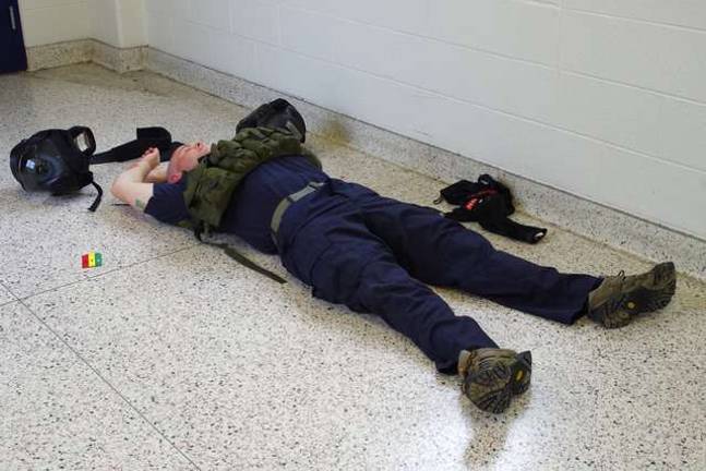 Vernon police train for the worst The lone gunman is shown after being shot and killed by Vernon Police. The shooter was portrayed by Vernon officer-in-training Brad Pindyck.