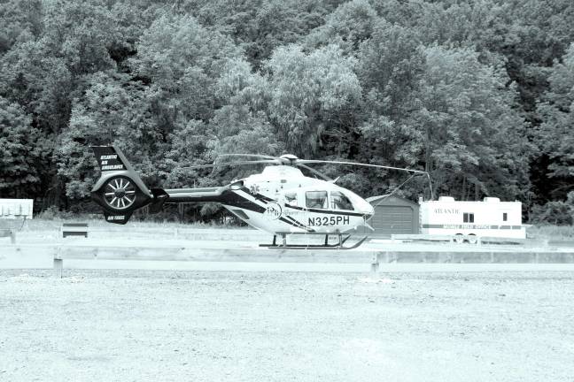 Where in responses People who identified themselves as Aaron Crawley, Jon Rockwell, Adrienne Murphy and Bob O'Reilly all knew last week's photo was of the Atlantic Healthcare helicopter, located near Mountain Creek in Vernon Township.