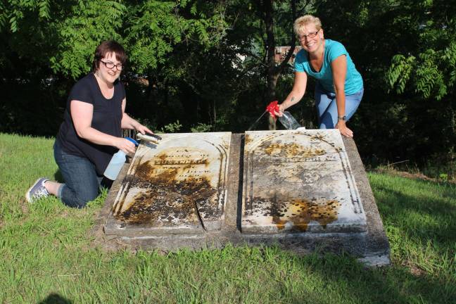 Cousins Donna Mitzka, left, and Lisaann VanBlarcom Permunian have been working hard cleaning the headstones at Longwell-Drew Cemetery in Vernon. Mitzka and Permunian are fifth cousins, once removed. This year, marks the 90th annual reunion of the descendants of Gilbert and Susannah (Washburn) Drew. For more information about the Drew Family Reunion please contact Permunian at lisaannpermunian@gmail.com.