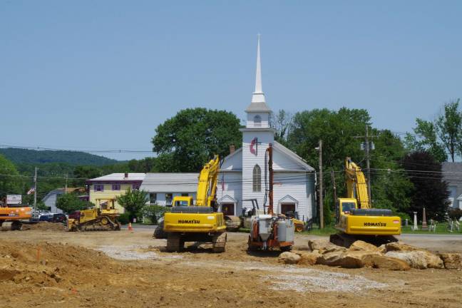 Photo by Chris Wyman The current view of the Vernon United Methodist Church is worth driving down to see as the area is being cleared of trees for the new CVS store and Bank Road.