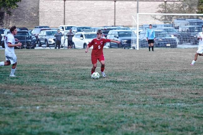 Sports roundup: Wildcats beat Patriots, 3-1 A High Point player controls the ball.