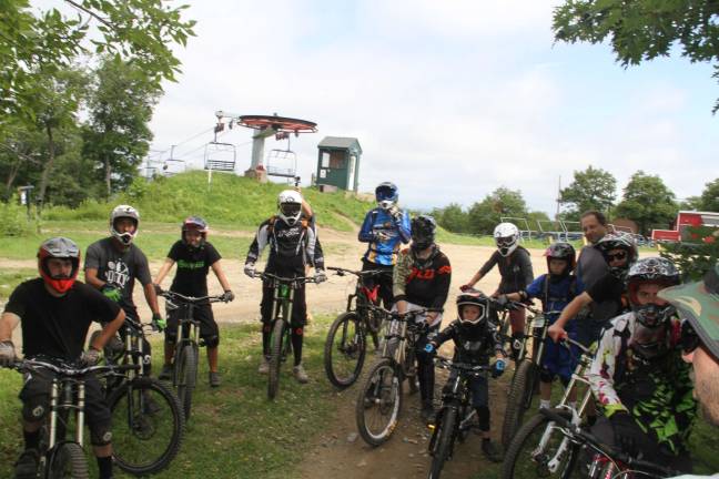 Photos by Amy Cilli A group of bikers waiting to hit the new trail.
