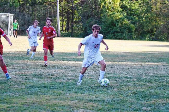 Sports roundup: Wildcats beat Patriots, 3-1 Newton’s Jack Boffa controls the ball during a soccer game Sept. 12 at High Point.
