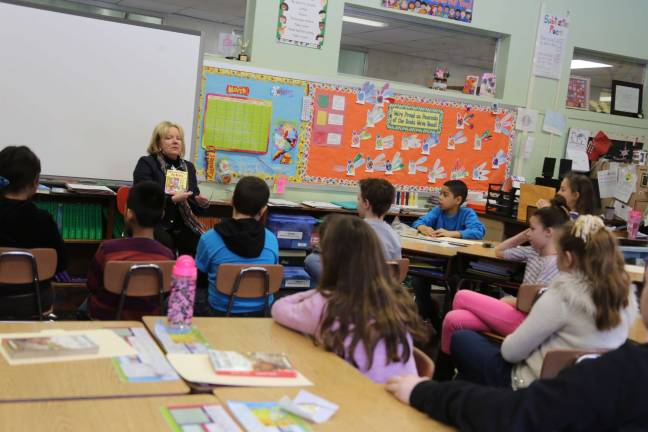 Wantage School hosts celebrity readers Executive Director Deborah Berry-Toon of Project Self-Sufficiency reads to students.
