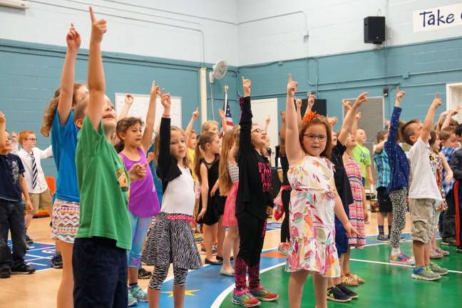 Walnut Ridge get up and dance PHOTOS BY VERA OLINSKI Walnut Ridge students move to the music.