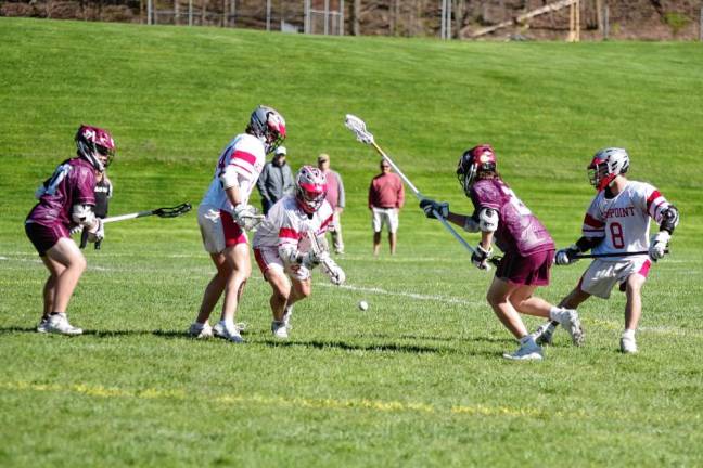 HP1 The Newton Braves and High Point Wildcats battle for control of the ball during a boys lacrosse game April 25 in Sussex. Newton won, 12-1 (Photos by George Leroy Hunter)