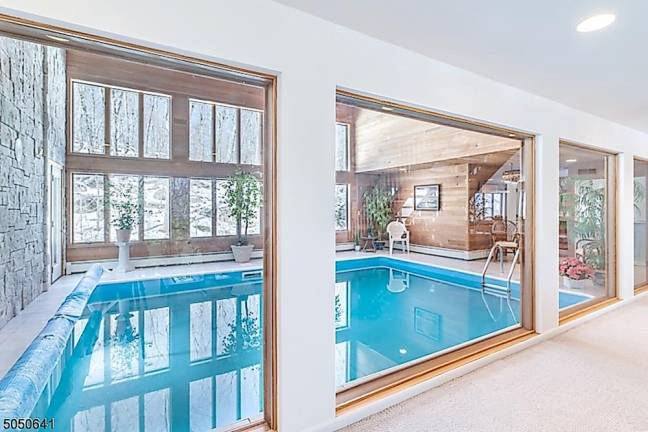 Indoor pool and mountain views will have you wanting to stay home