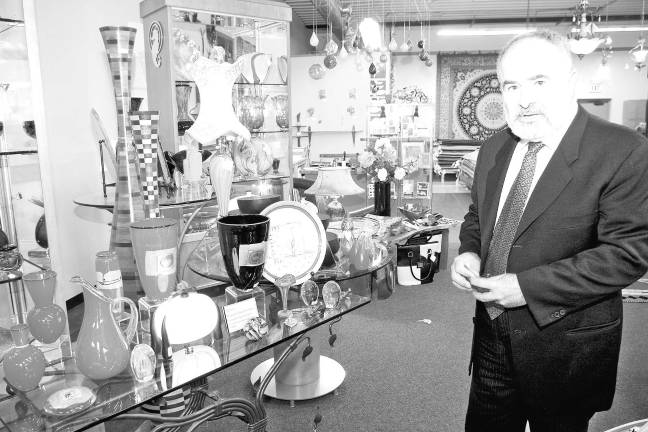 Hidden treasures to be found below Crystal Springs Gallery owner Bruce Ghorbanian brings attention to some of the handmade treasures Silken Wool Home has to offer.