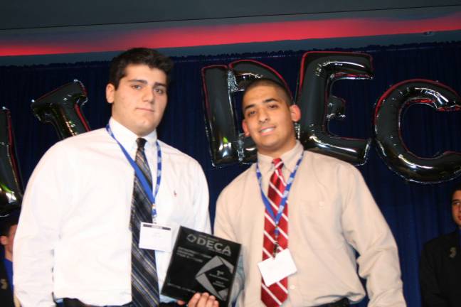 DECA competitors from VTHS head for Nationals as they topple their competition John Lipari (left) and Kirolos Mikaeil bested everyone else in their category, Entrepreneurship-Growing Your Business, to win first place and a chance to compete in the DECA Nationals in Anaheim, Cali.