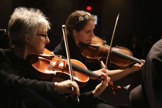 VTHS orchestra collaborates with N.J. symphony Brittany Gaule is shown on viola.