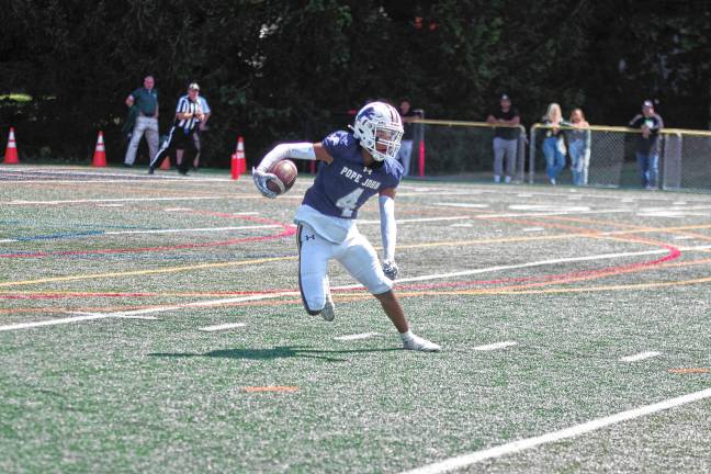 Football roundup: High Point beats Jefferson <b>Pope John kick returner Zayne Carswell is on the move in the second quarter. (Photo by George Leroy Hunter)</b>