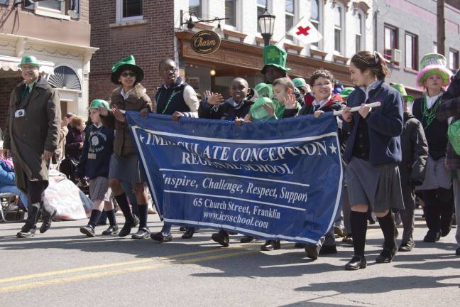Newton goes green Marchers from Immaculate Conception Regional School in Franklin.